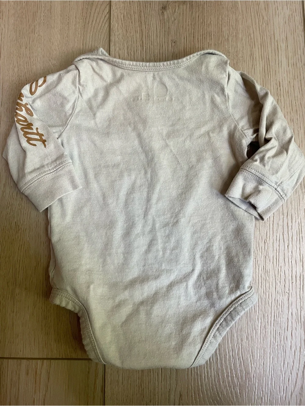 Carhartt Cream Baby Long Sleeve Onesie with Yellow Logo